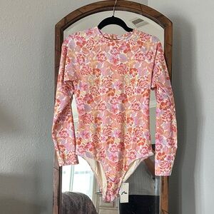 Rusty Vibrant Rusty Brand Floral Swimsuit. NWT, size US XL.
